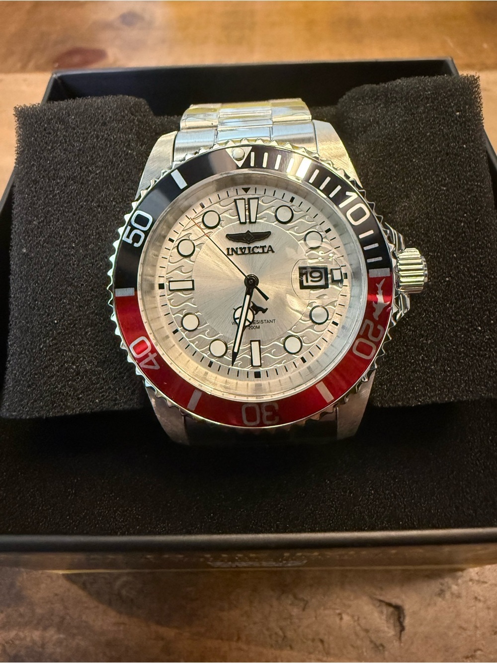 Invicta Silver Dial Watch with Red and Black Bezel